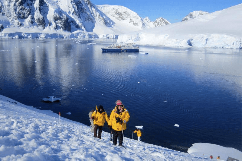 Kayaking through the Antarctic Peninsula is an unforgettable experience.
