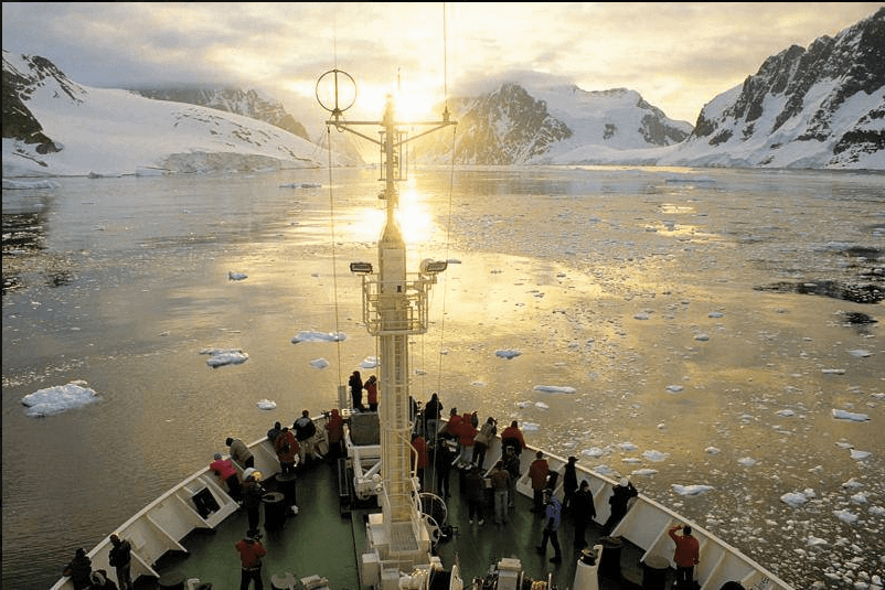Polar cruise passengers exploring beautiful Antarctica